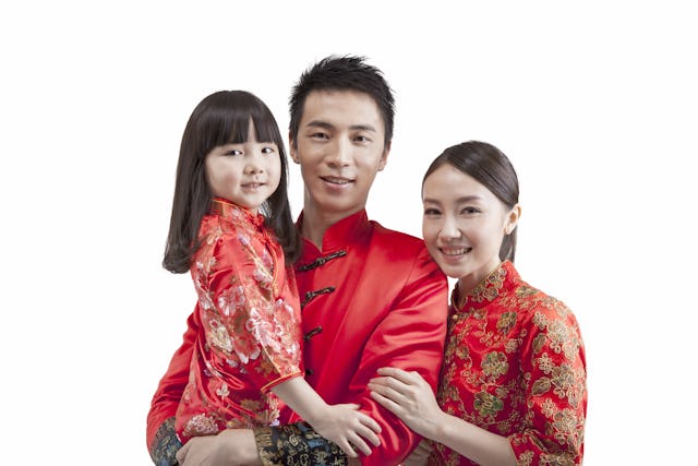 Chinese family in New Year Tang Suit